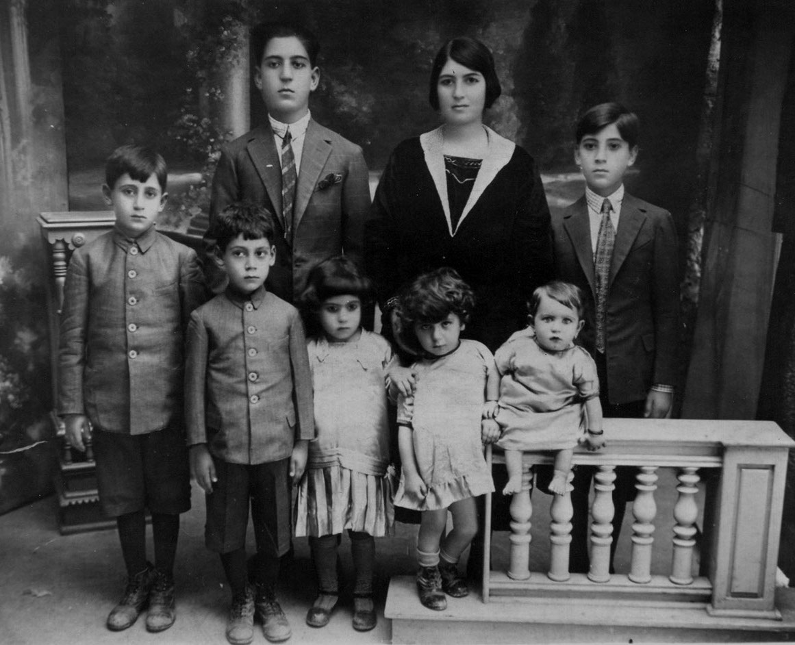 © Family photo, circa 1928. Author's great-grandmother with her children, including author's grandmother
